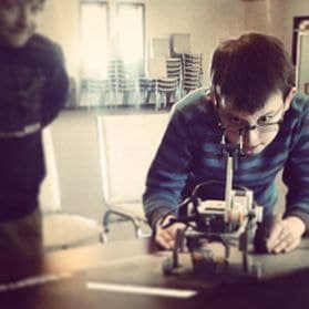 Student preparing a robotics run